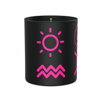 AstroAura Candle in black container with pink sun and pink Aquarius star sign symbol. Customers can select sun-moon-rising symbols and star signs in pink, yellow or black (black is not suitable for this candle as the container is black) Candle can be personalised by customer with their sun-moon-rising signs.